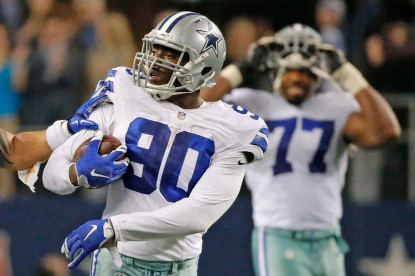 Dallas Cowboys defensive end DeMarcus Lawrence (90) is pictured after his fumble recovery...