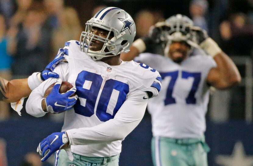 Dallas Cowboys defensive end DeMarcus Lawrence (90) is pictured after his fumble recovery...