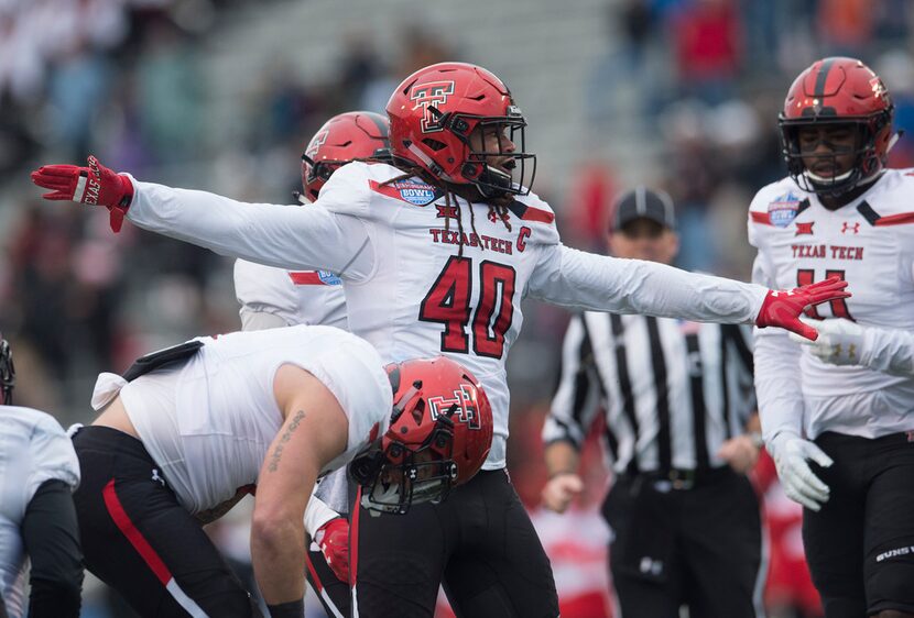 FILE - Texas Tech linebacker Dakota Allen (40) celebrates a stop on fourth down during the...