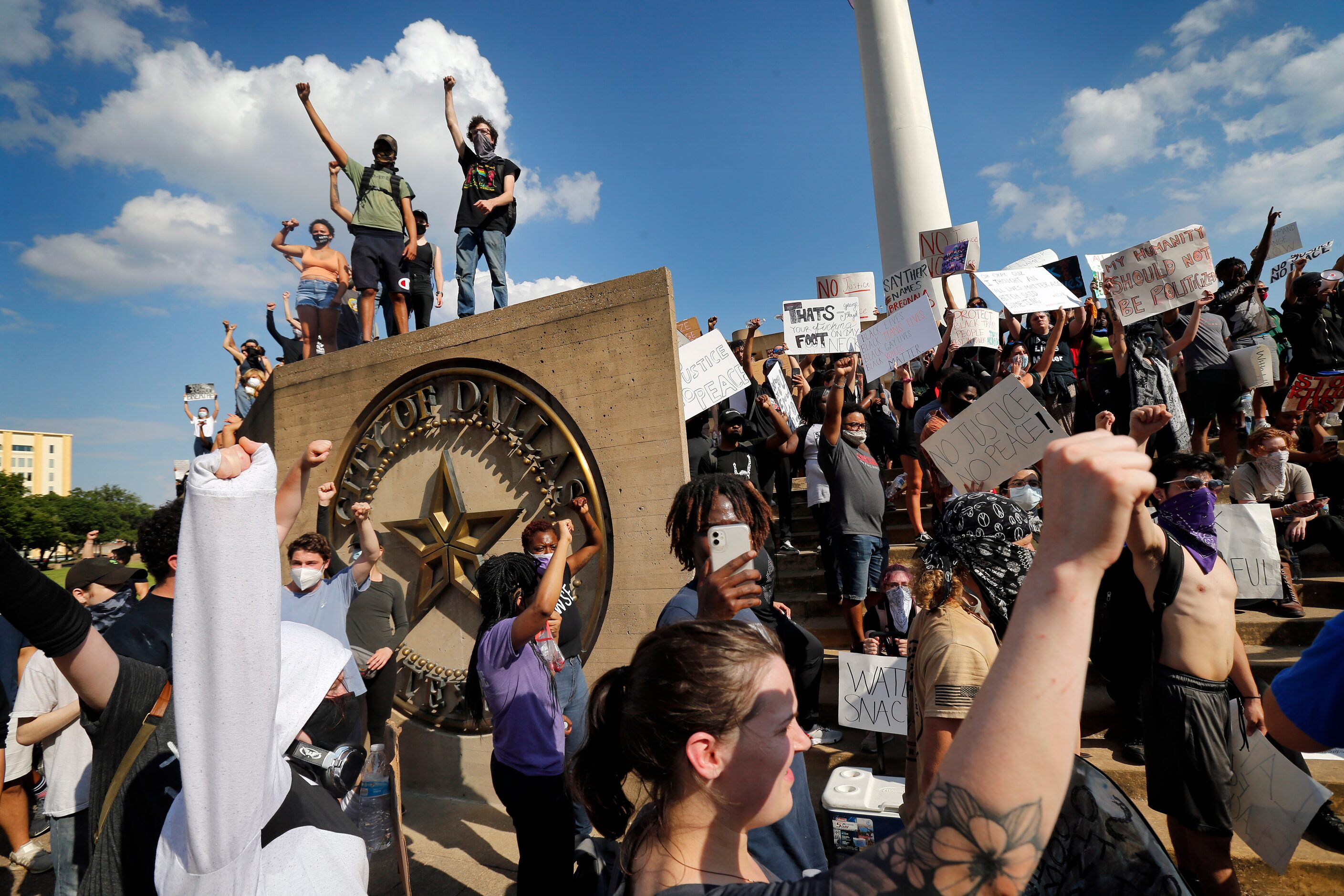 Protestors supporting Black Lives Matters rally on the steps outside Dallas City Hall in...