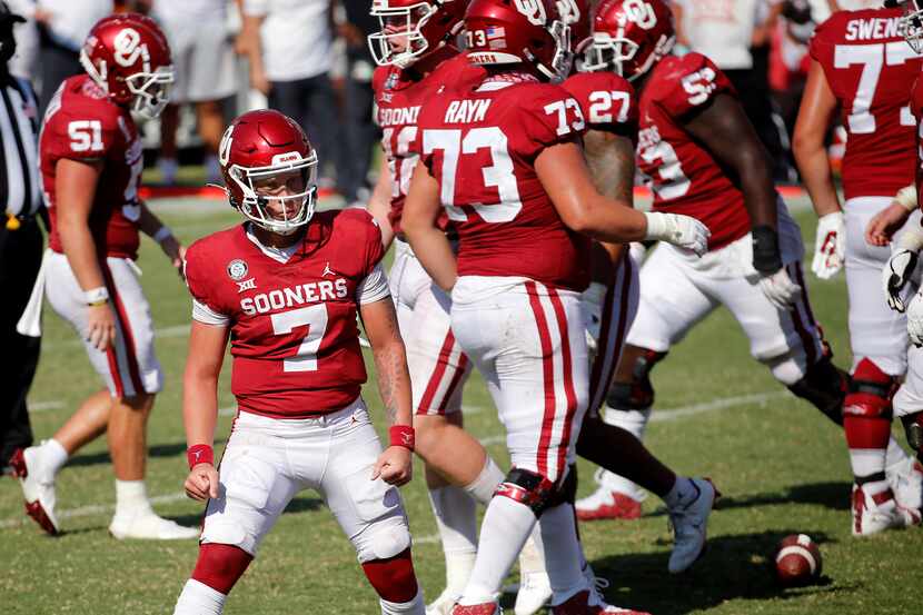 Oklahoma Sooners quarterback Spencer Rattler (7) gives a look to the student sedition after...