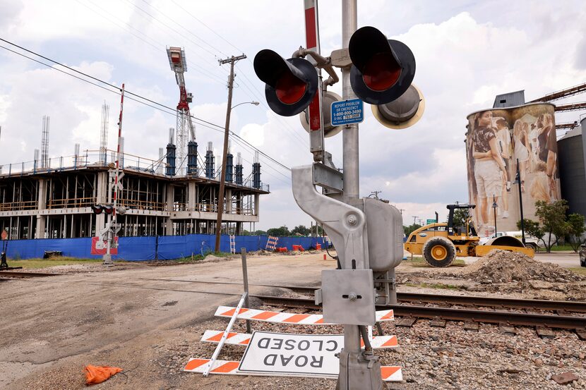 The site of the McKinney City Hall is located on the rail line and the front of the building...