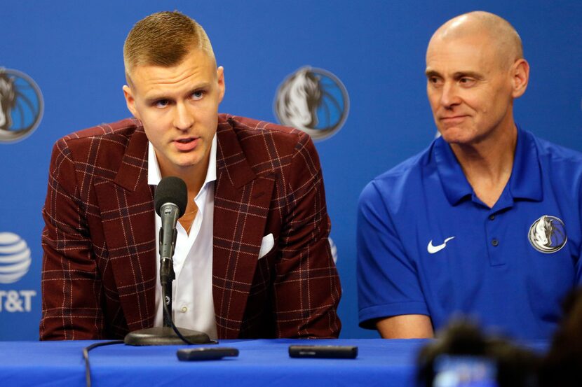 Dallas Mavericks forward Kristaps Porzingis (6) answers a question as Dallas Mavericks head...