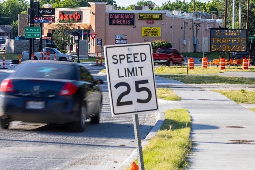 An electronic sign advises drivers of an upcoming traffic flow change, scheduled to take...