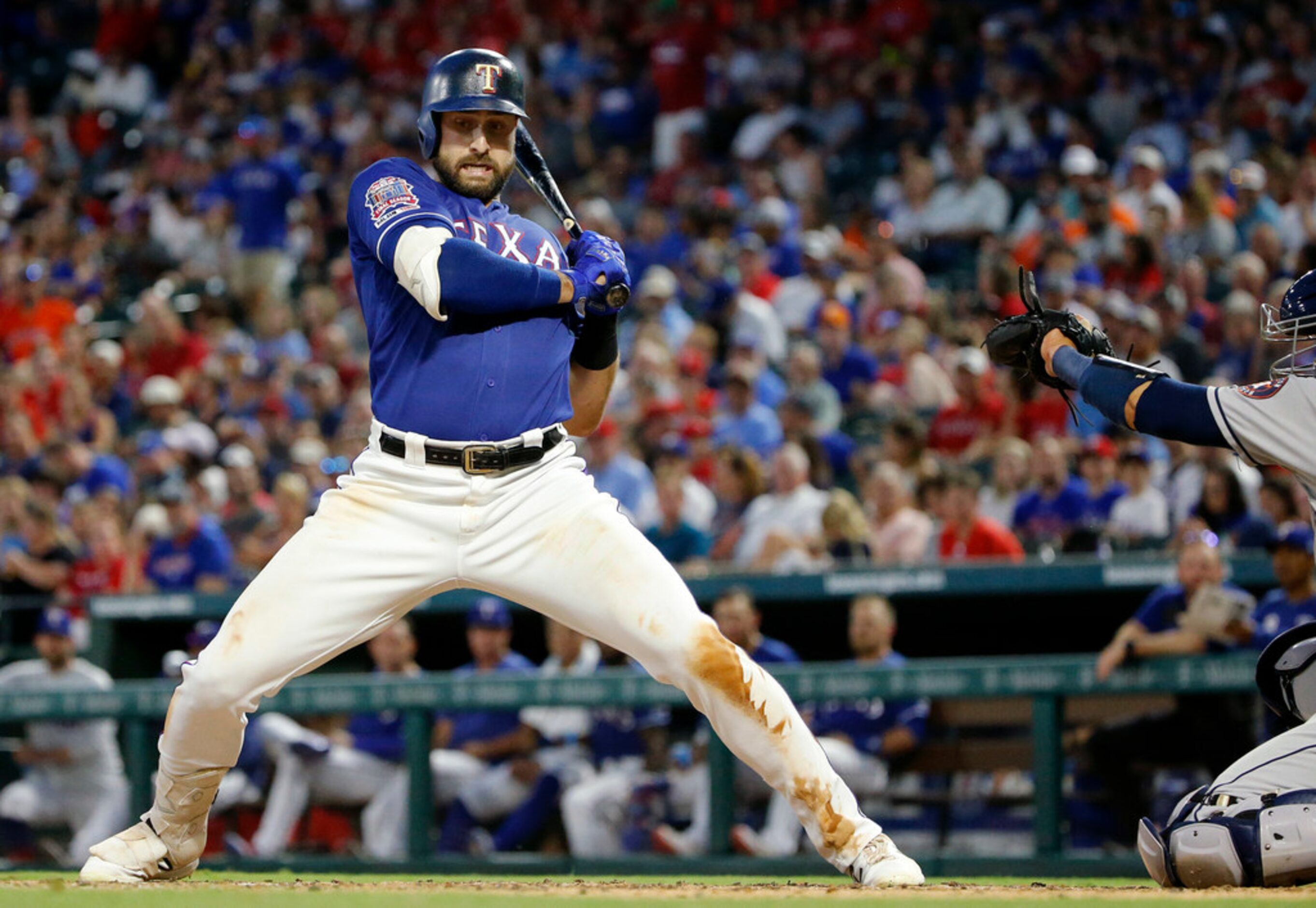 Texas Rangers Joey Gallo (13) leans away from an inside pitch by the Houston Astros during...