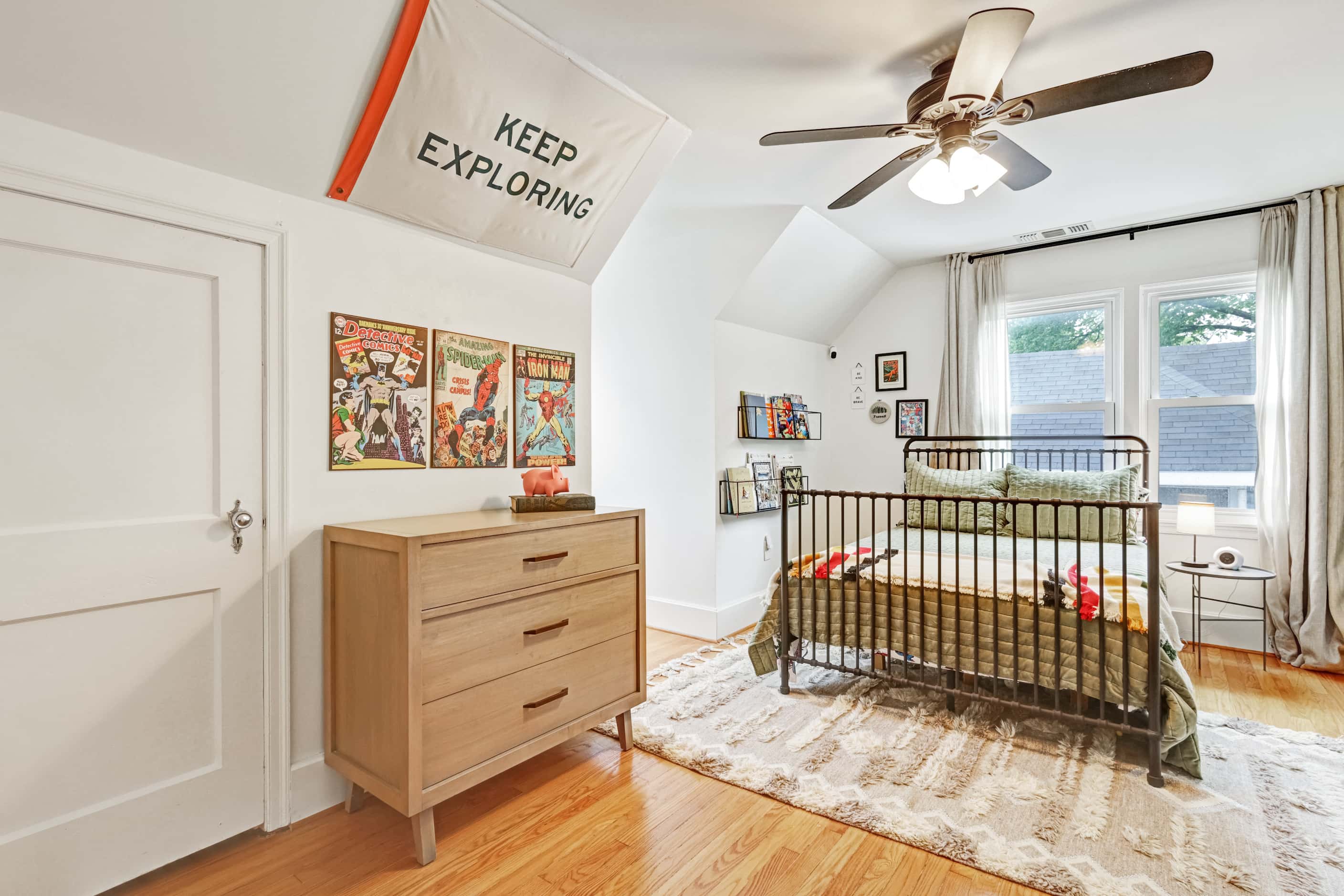 This upstairs bedroom has views of the neighborhood and plenty of natural light.
