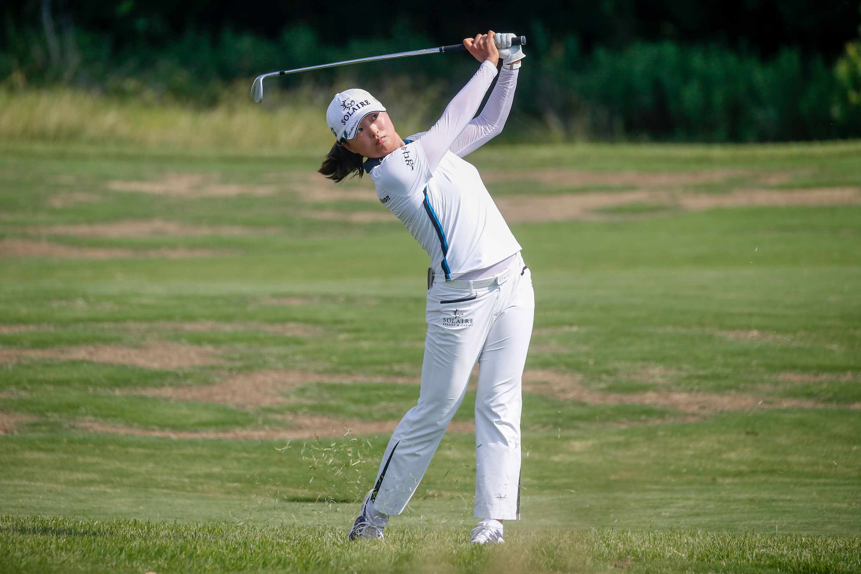 Professional golfer Jin Young Ko plays a ball off the No. 12 fairway during the final round...