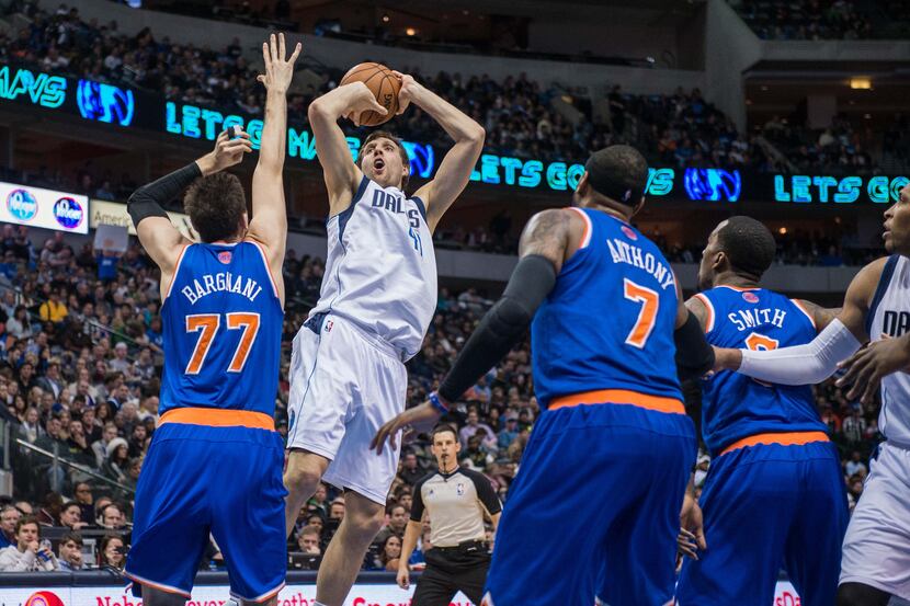 Jan 5, 2014; Dallas, TX, USA; Dallas Mavericks power forward Dirk Nowitzki (41) shoots over...