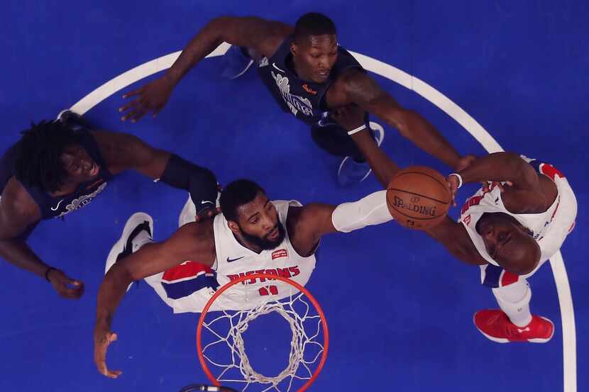 Detroit Pistons center Andre Drummond (0) reaches for a rebound during the first half of an...