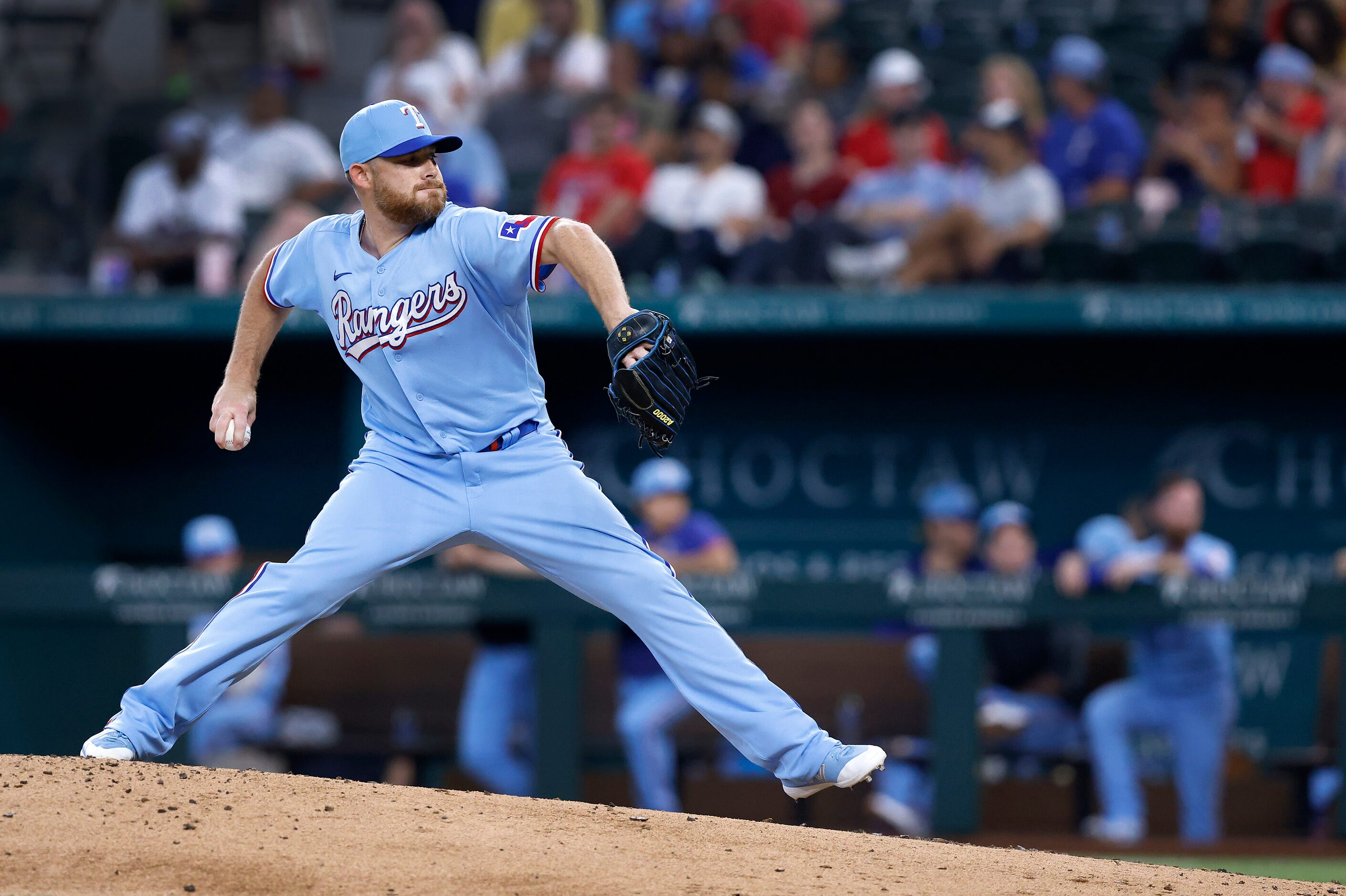 Texas Rangers relief pitcher Ian Kennedy (31) throws during the ninth inning against the...