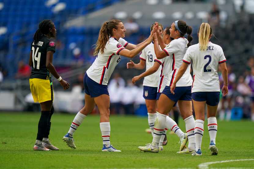 United States' Sophia Smith, second from right, is congratulated by a teammate after scoring...