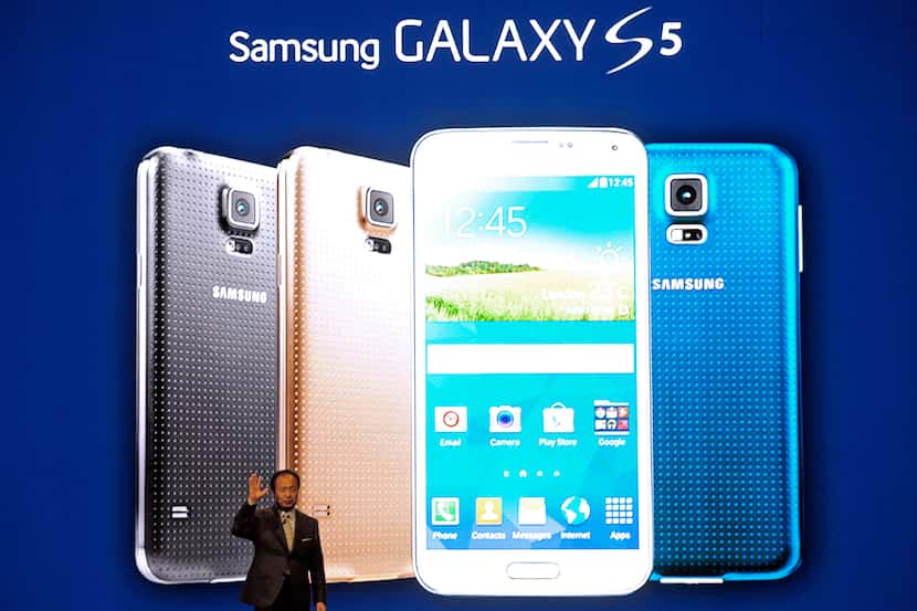 Samsung CEO J.K. Shin presents the new Samsung Galaxy S5 at the Mobile World Congress, the...
