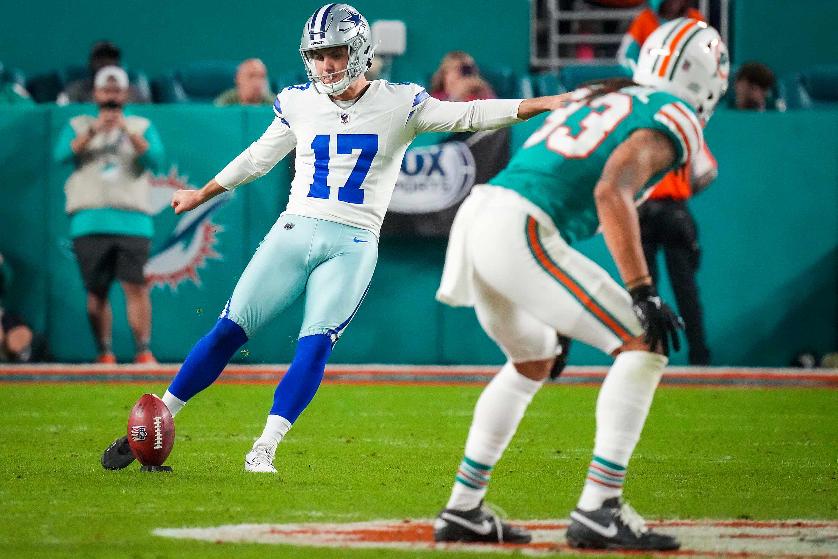 Dallas Cowboys place kicker Brandon Aubrey (17) kicks off after the Cowboys took the lead...