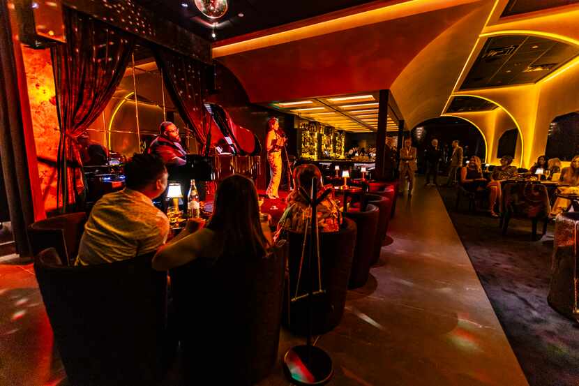 Regines, a new speakeasy in Dallas, has live music and a sultry dining room.
