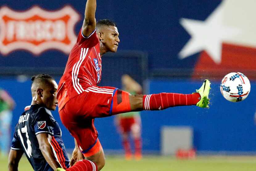 FC Dallas midfielder Carlos Gruezo (7) defends by kicking the ball out of bounds in front of...