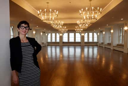 Crazy Water Hotel General Manager Cynthia Nelson stands on the seventh-floor ballroom of...