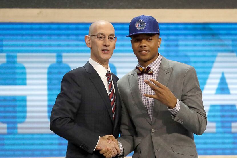 Markelle Fultz with NBA Commissioner Adam Silver after Fultz was selected first overall by...