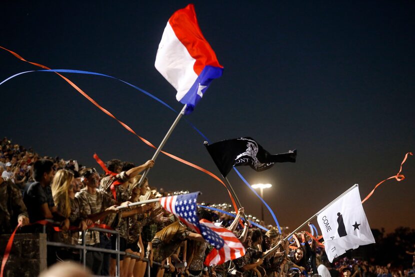 Richland fans celebrate a touchdown against Birdville during their UIL high school football...