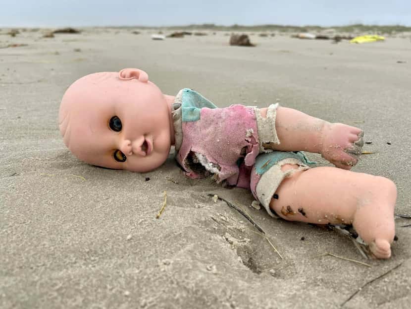 Creepy baby dolls have been washing up on a 40-mile stretch of Texas'  gulf shore, from...