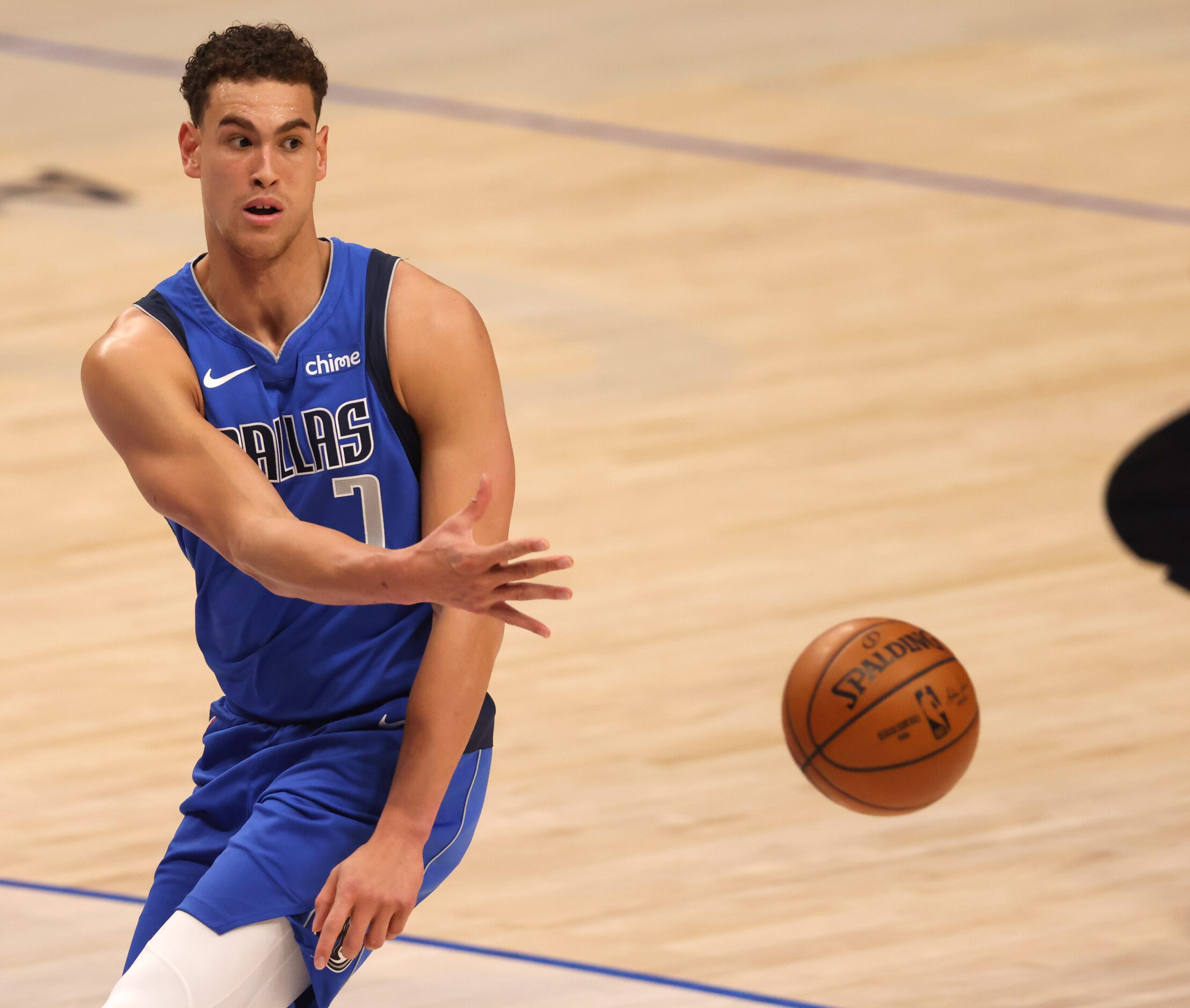 Dallas Mavericks center Dwight Powell (7) passes the ball in a game against the Golden State...