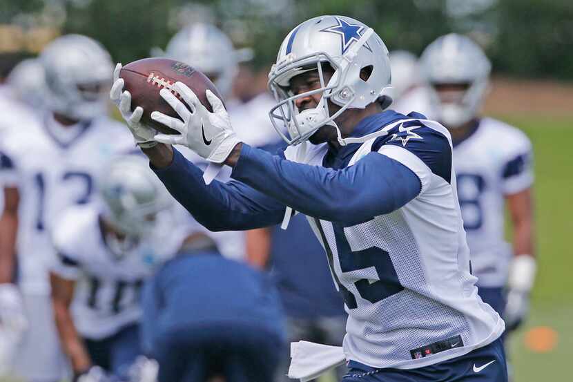 Dallas Cowboys wide receiver Deonte Thompson (15) catches a pass during Dallas Cowboys OTA...