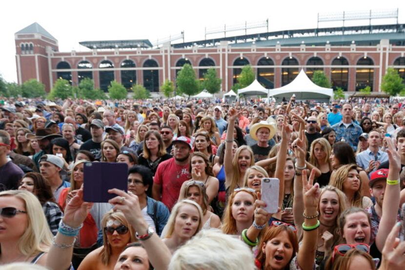 Thousands gathered on the North Lawn of Globe Life Park on Friday for the first day of the...