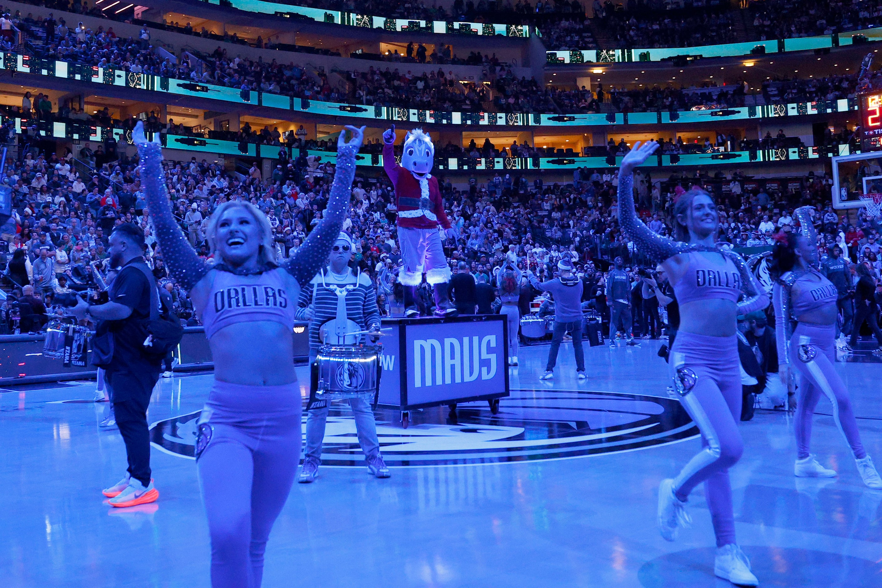 Dallas Mavericks mascot Champ performs before an NBA basketball game against the Minnesota...