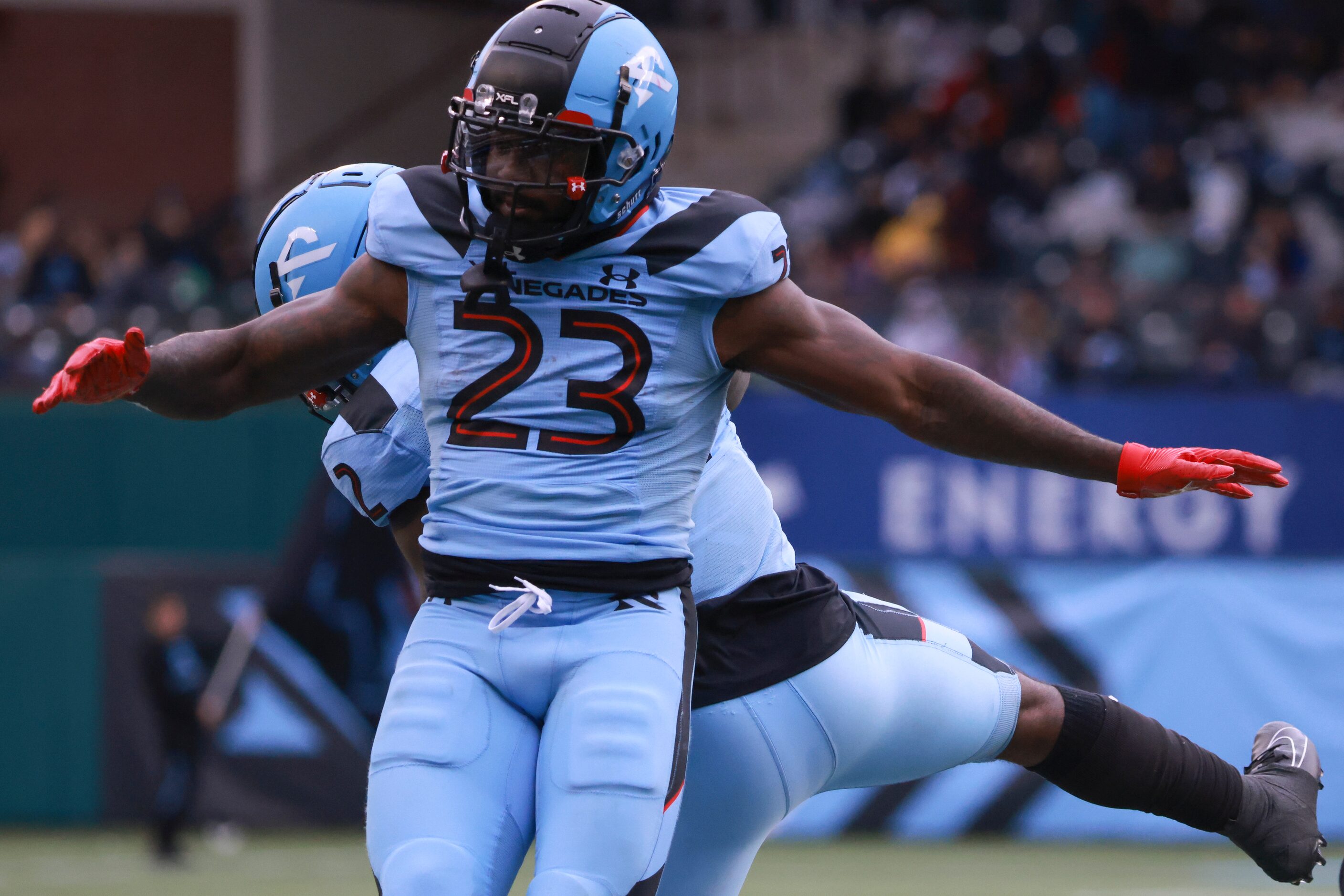 Arlington Renegades running back De'Veon Smith (2) and Keith Ford (23) jump celebrating...