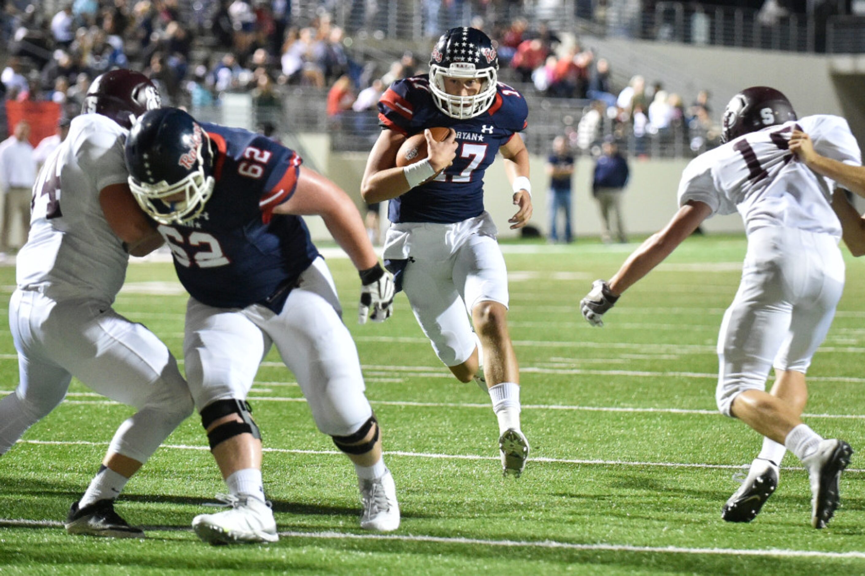 Ryan senior quarterback Creed Gentry (17) finds a hole and runs the ball against the Sherman...