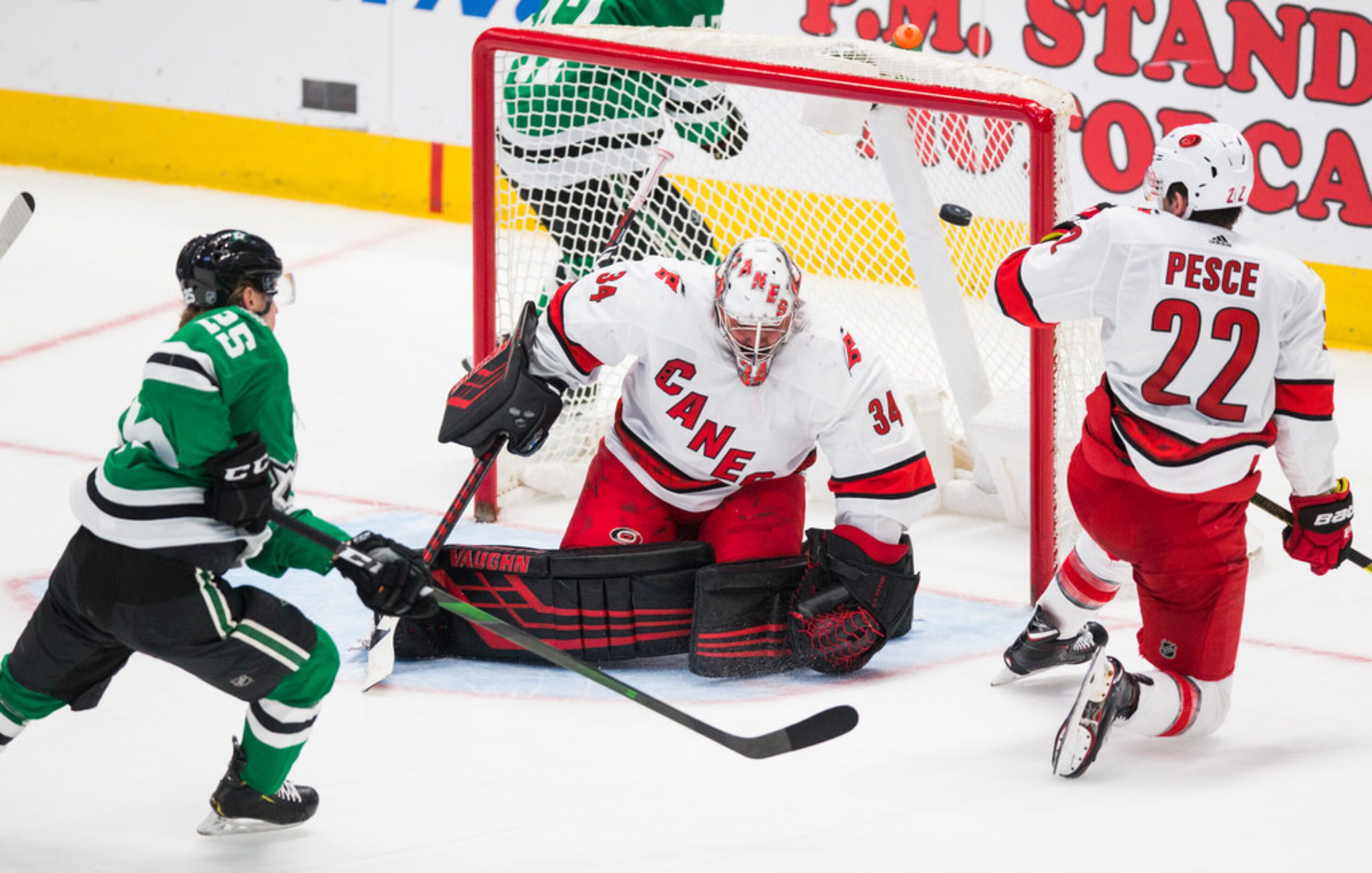 Dallas Stars left wing Joel Kiviranta (25) makes a shot at the goal, which is protected by...