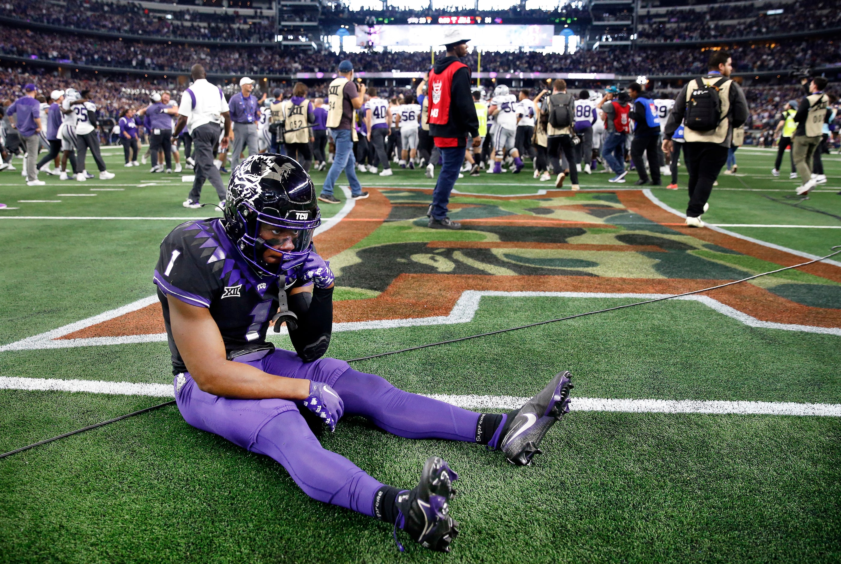 TCU Horned Frogs cornerback Tre'Vius Hodges-Tomlinson (1) sits on the field as the Kansas...