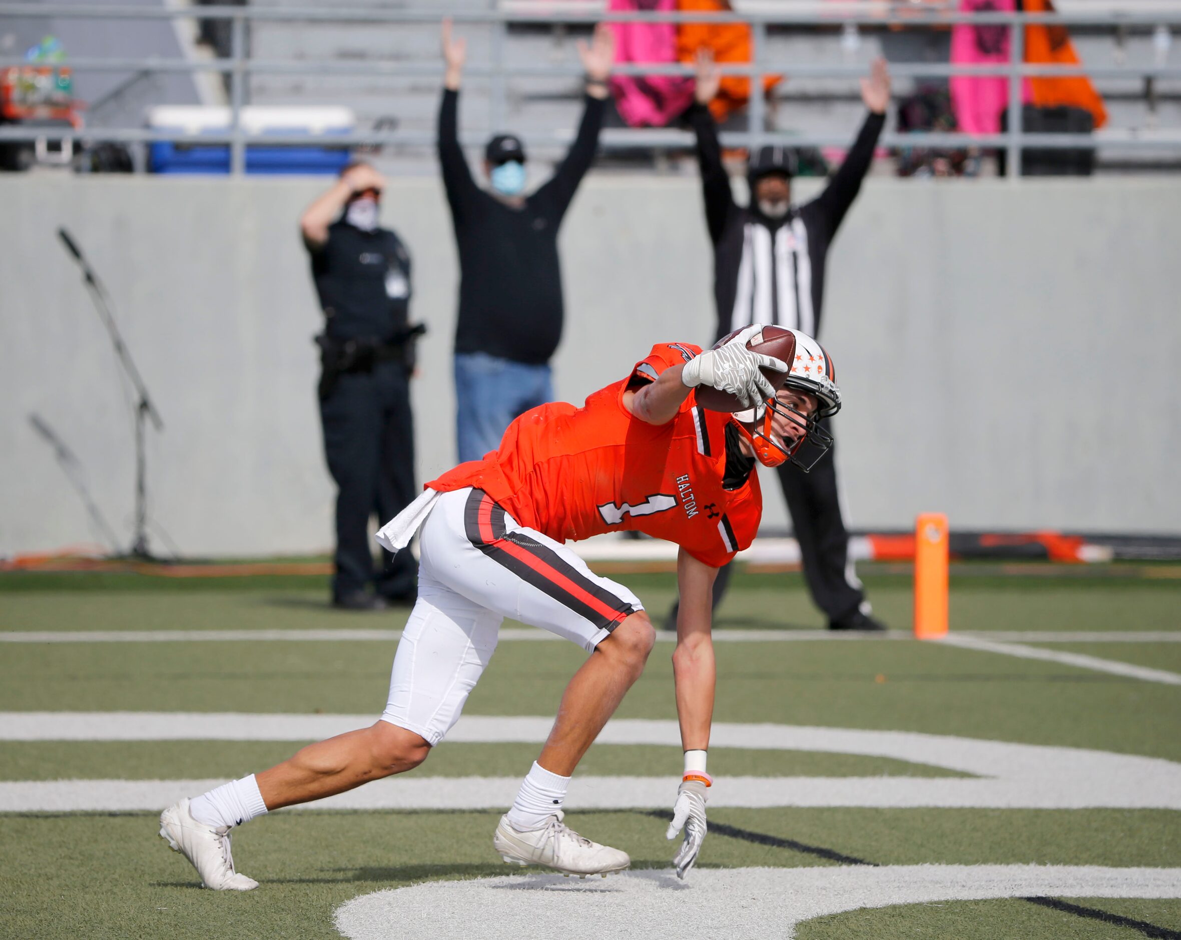 Haltom receiver Hunter Villavicencio (1) celebrates his touchdown reception against Euless...