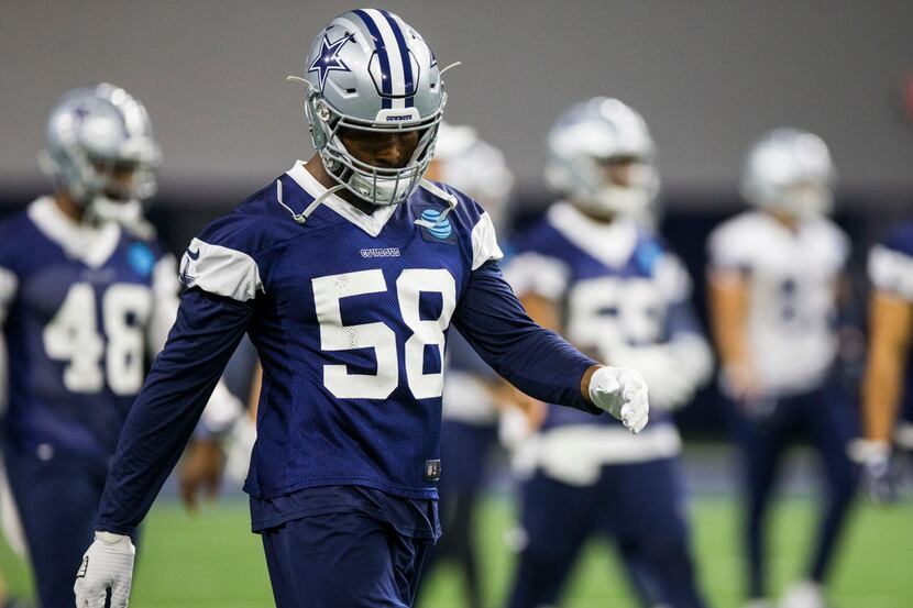Defensive end Robert Quinn (58) participates in a Dallas Cowboys OTA practice on Wednesday,...