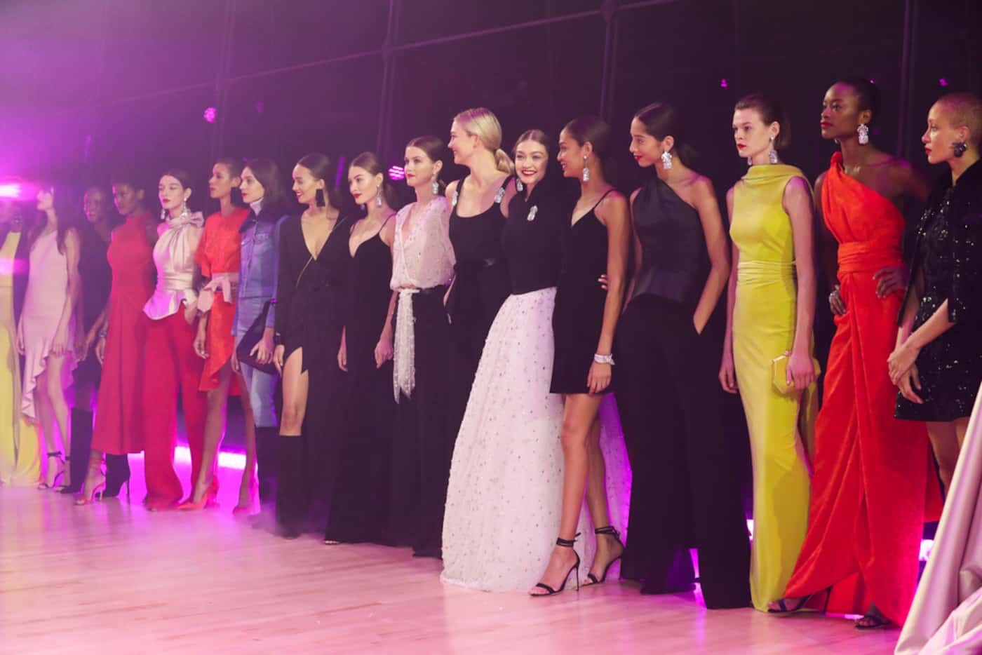 Karlie Kloss (center), Gigi Hadid, Joan Smalls and models walk the runway in New York at the...