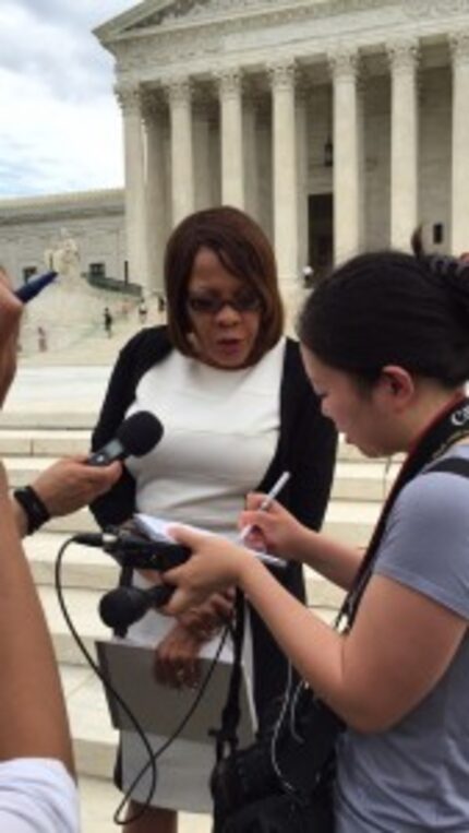  Gwen Jackson of Sugarland speaks with reporters outside the Supreme Court following its...