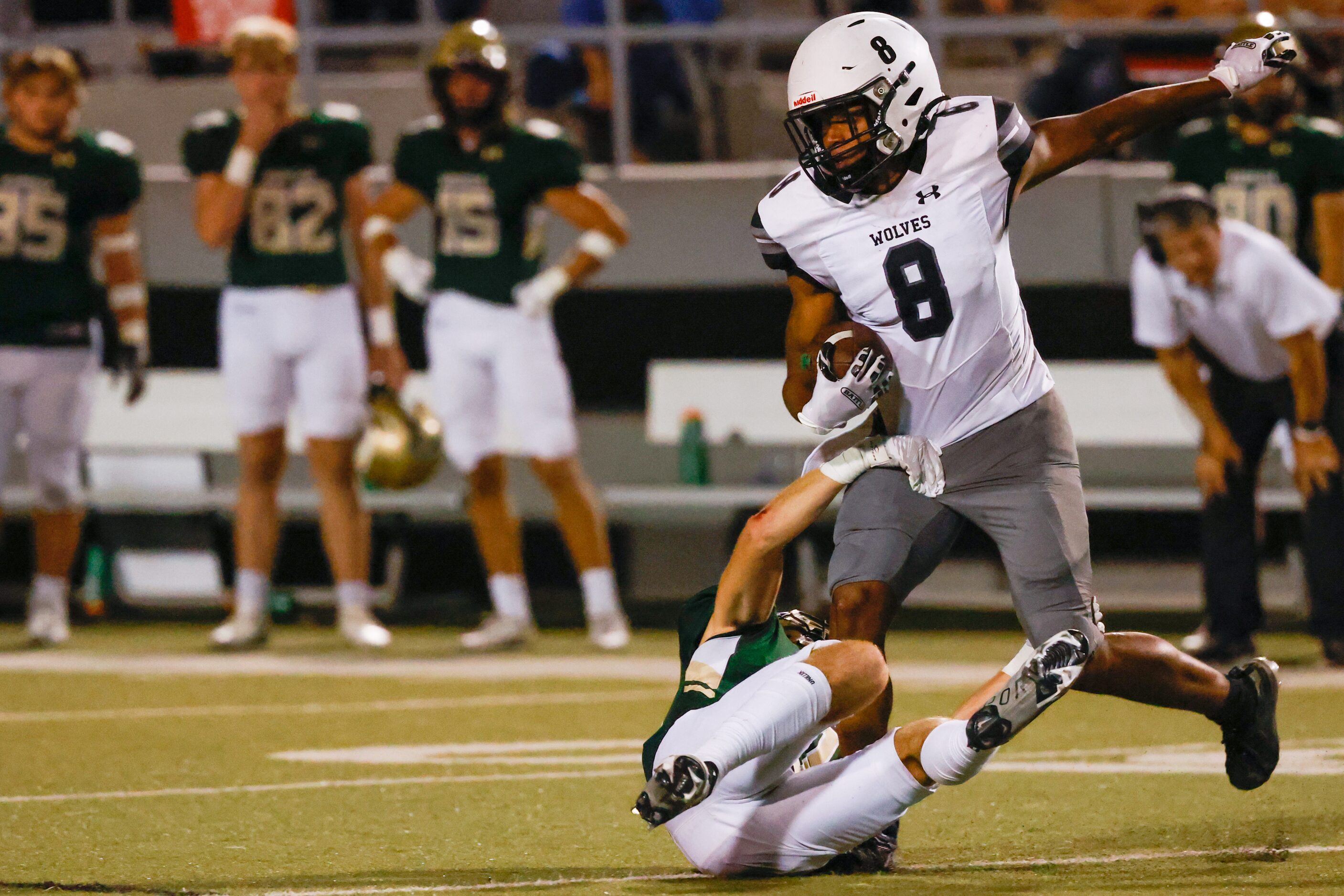 Mansfield Timberview defensive back Jordan Sanford (8) carries as intercepted pass down the...