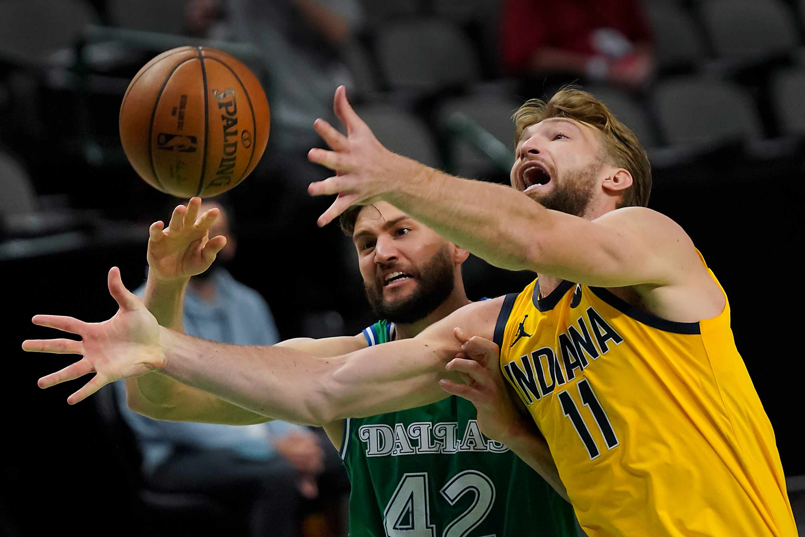 Dallas Mavericks forward Maxi Kleber (42) fights for a rebound against Indiana Pacers...