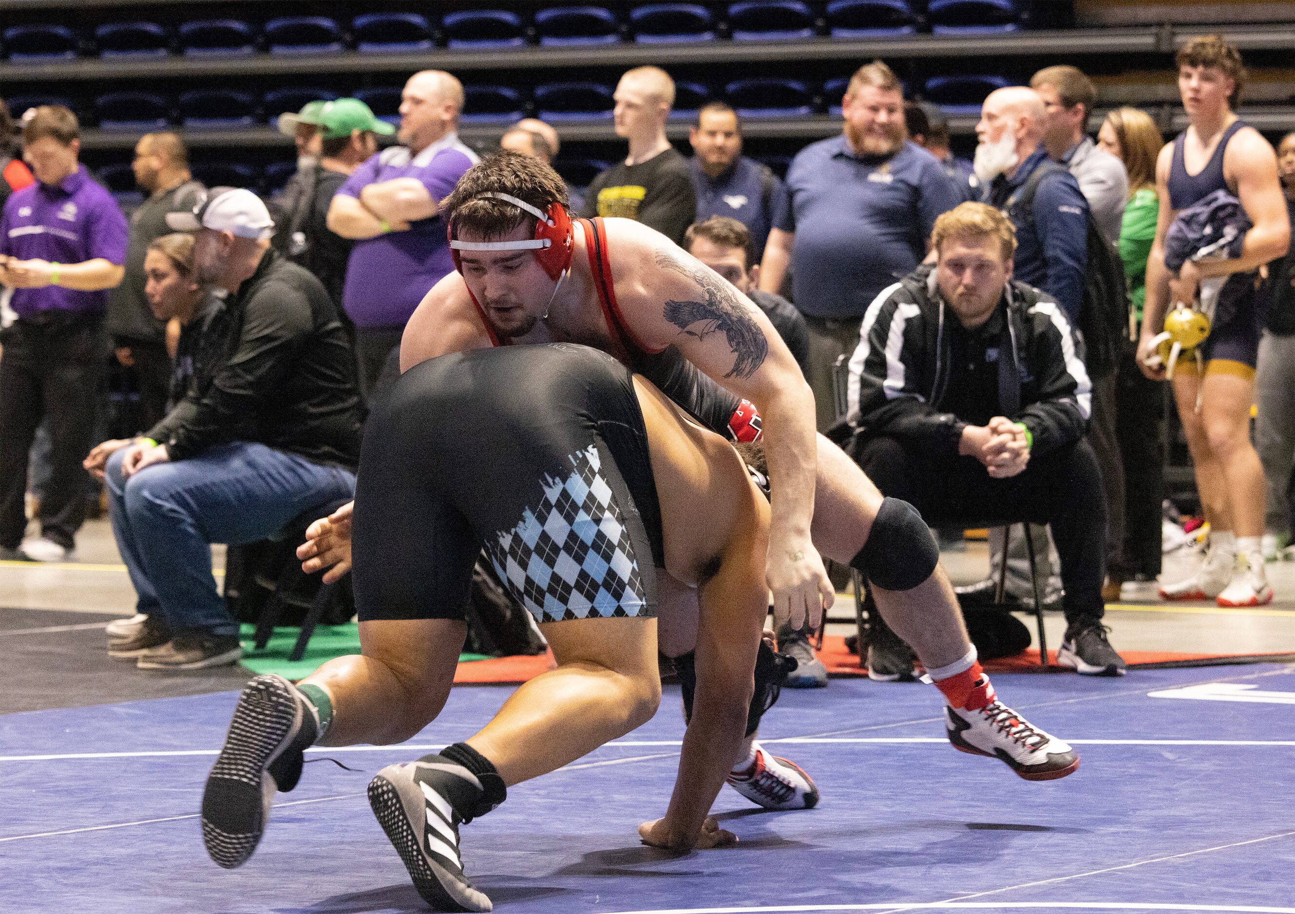 Drake Madole from Allen (right) wrestles Jarra Anderson from Katy Paetow in the 6A boys 285...