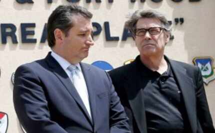  Sen. Ted Cruz and Gov. Rick Perry at a news conference at Fort Hood. April 2014 file photo....