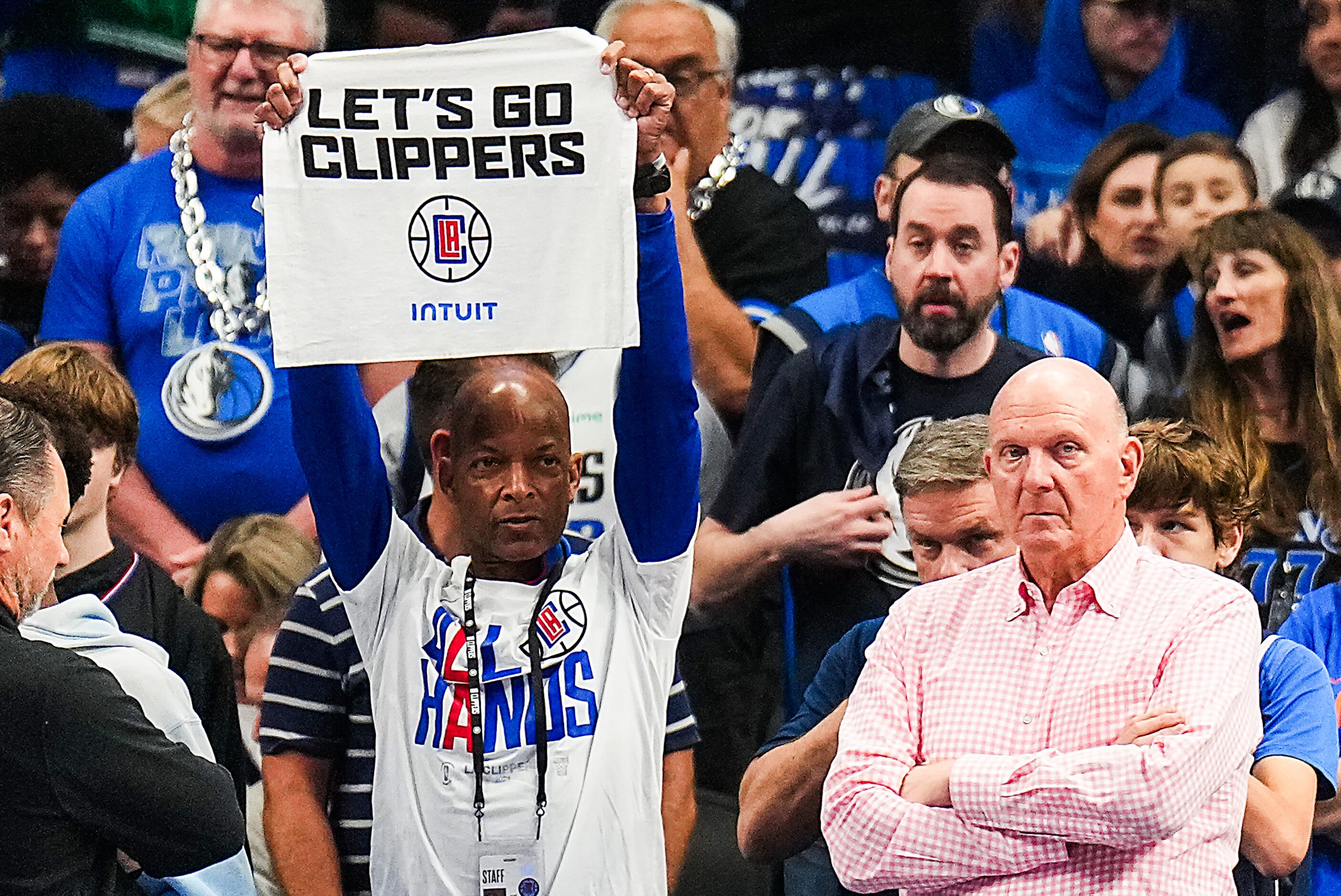 LA Clippers owner Steve Ballmer (right) watches the teams warm up with Chaz Fitzhugh before...