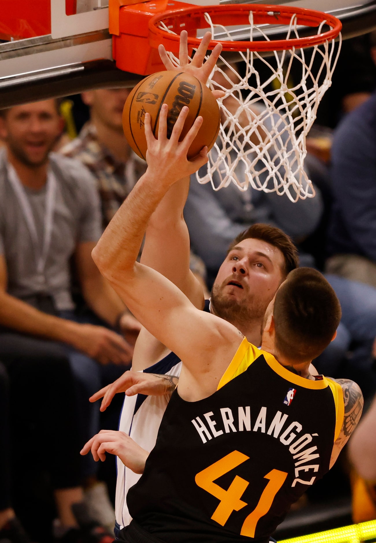 Dallas Mavericks guard Luka Doncic (77) blocks a shot attempt from Utah Jazz forward Juancho...