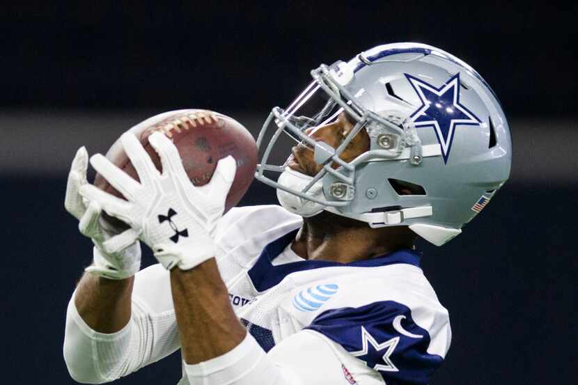 Dallas Cowboys wide receiver Randall Cobb (18) catches a pass during a Dallas Cowboys OTA...