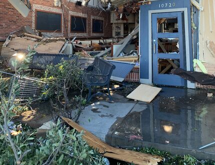 The area to the left of the front door shows the demolished restaurant Fish City Grill....