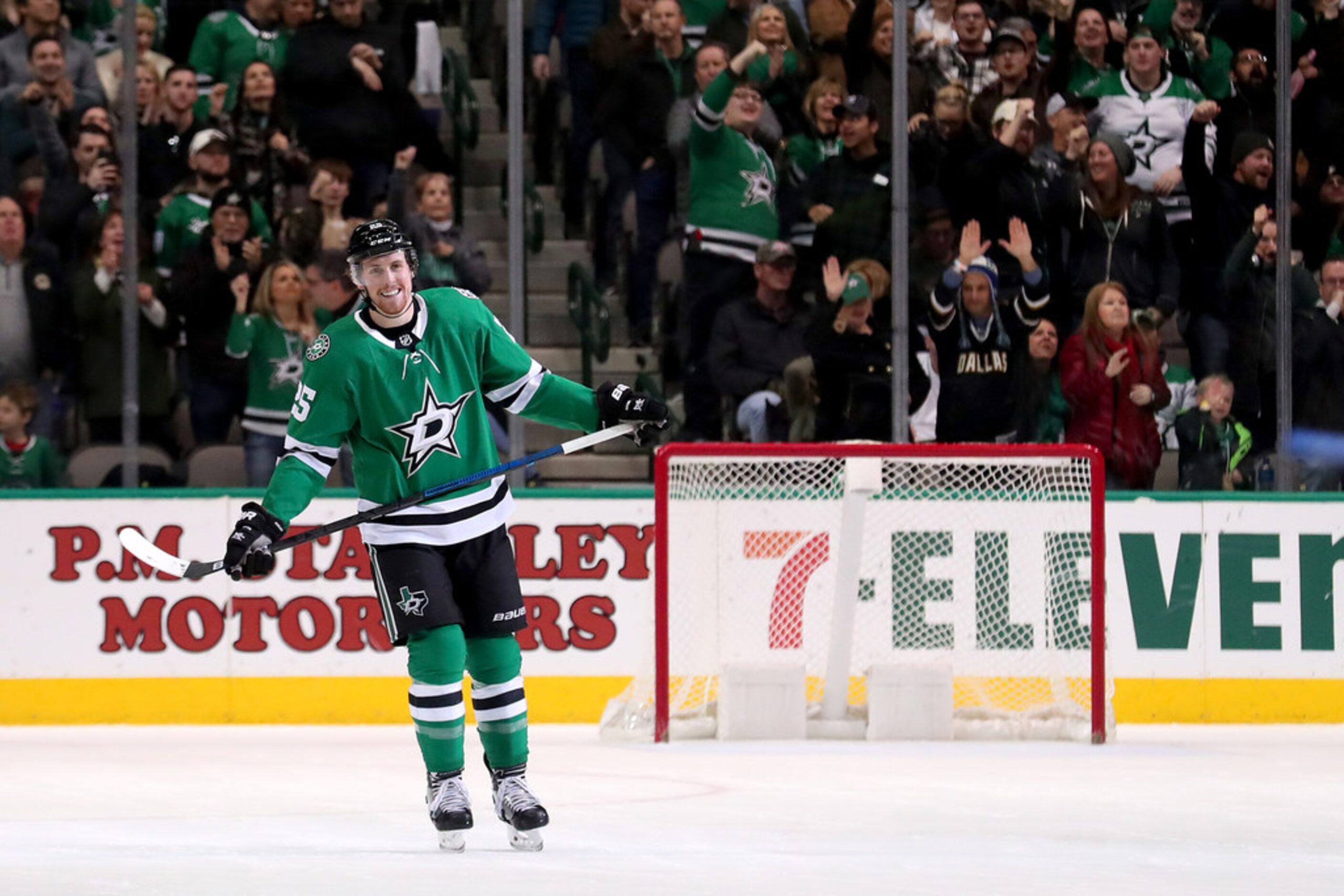 DALLAS, TEXAS - JANUARY 19: Brett Ritchie #25 of the Dallas Stars celebrates after scoring a...