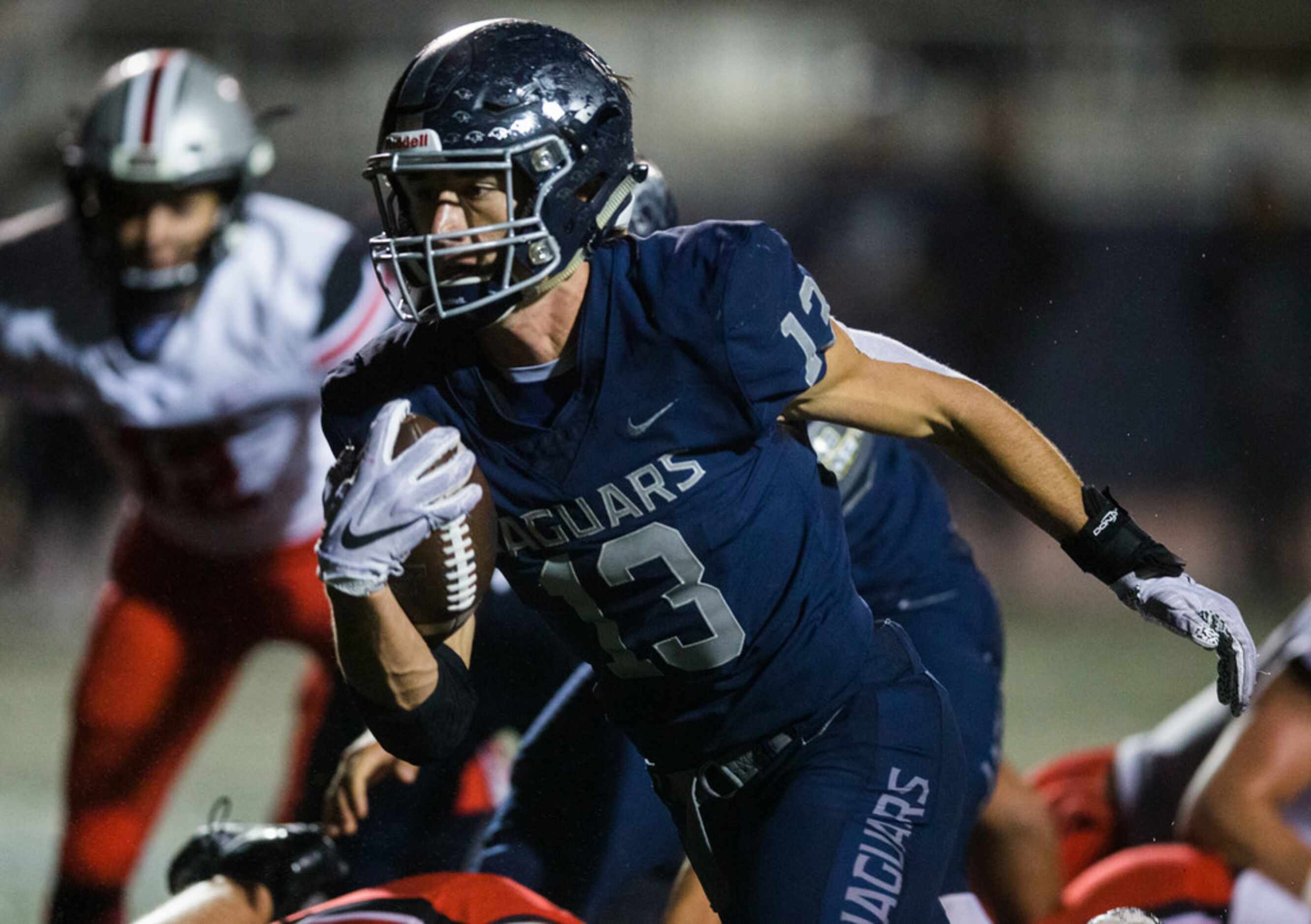 Flower Mound running back Pierce Hudgens (13) runs to the end zone for a touchdown during...