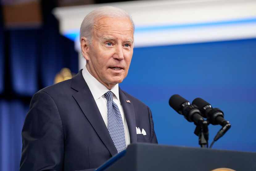 FILE - President Joe Biden responds to questions from reporters after speaking about the...