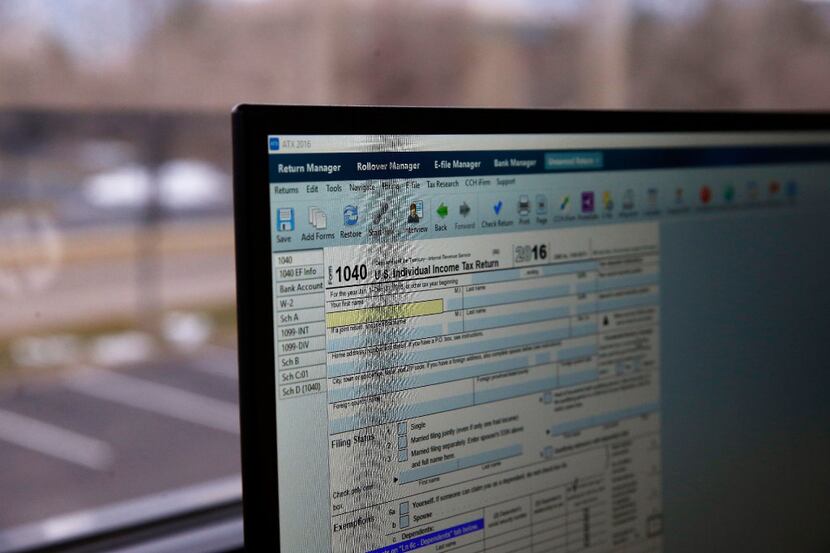 In this Jan. 14, 2017, photo, an online tax form is displayed on a computer at the offices...