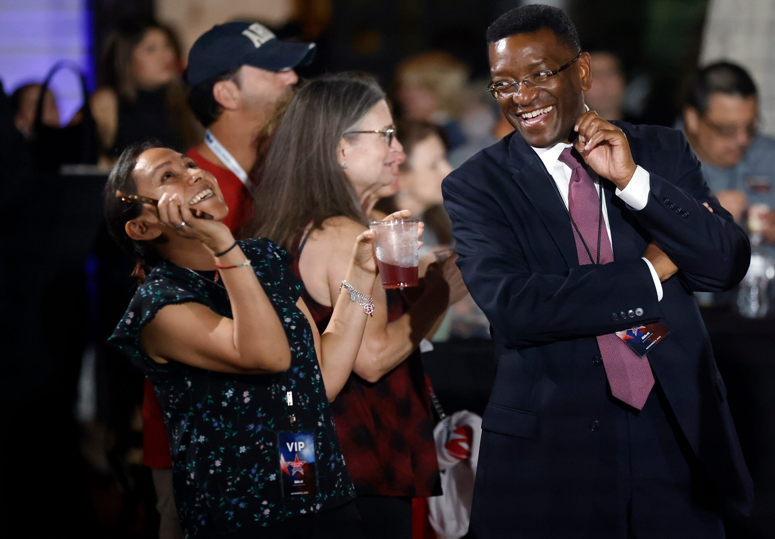 Supporters of Texas Governor Greg Abbott enjoy themselves at a watch party held outside...