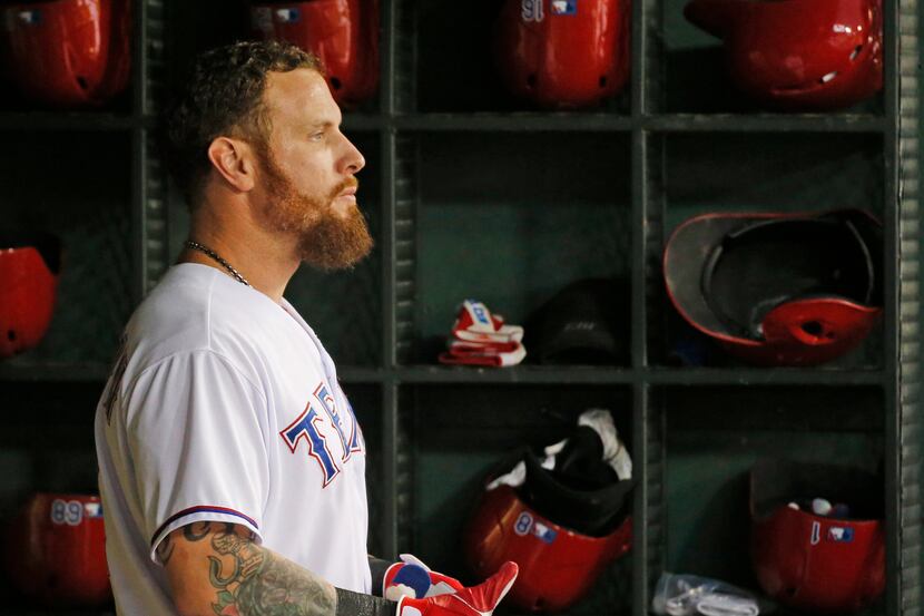 Texas Rangers left fielder Josh Hamilton (32) is pictured in the dugout during the Los...