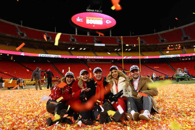 Clark Hunt (center) celebrates the Kansas City Chiefs' AFC Championship win with his family...